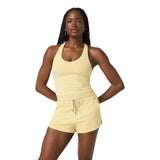 Vuori 02. WOMENS APPAREL - WOMENS SS SHIRTS - WOMENS TANK ACTIVE Women's Halo Performance Crop 2.0 LPH LEMON SNAP HEATHER