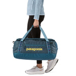 Patagonia 09. PACKS|LUGGAGE - LUGGAGE - DUFFELS Black Hole Duffel 55L TLMP TIDAL TEAL W LUMINOUS PINK