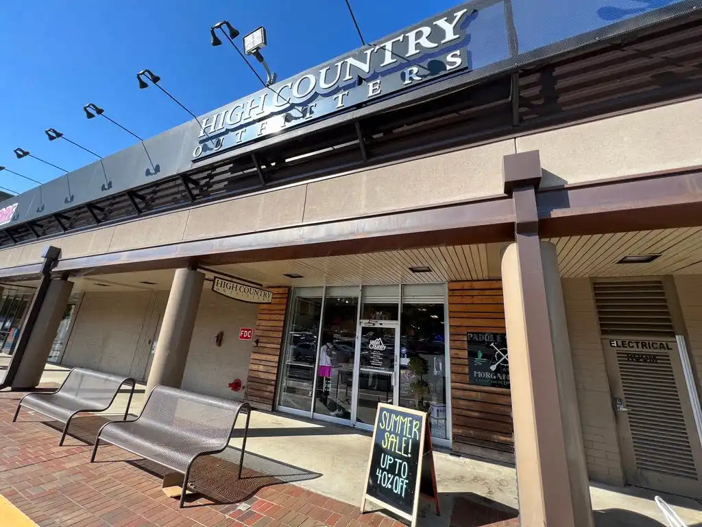 High Country Shoes storefront with illuminated signage.