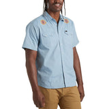 Howler Bros 01. MENS APPAREL - MENS SS SHIRTS - MENS SS BUTTON UP Men's Crosscut Deluxe Short Sleeve BEACH BLOOMS | BLUE CHAMBRAY