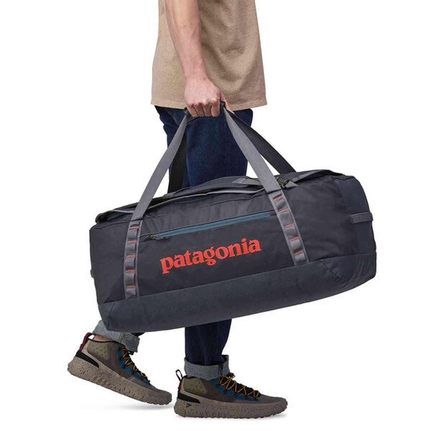 patagonia ultralight black hole duffel bag 40L Unity Fitz: Ink Black but with a huge step toward environmental impact reduction with 100% recycled body fabric Patagonia Black Hole Duffel 100