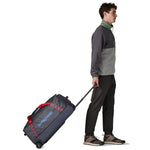 Patagonia 09. PACKS|LUGGAGE - LUGGAGE - ROLLING DUFFLES Black Hole Wheeled Duffel 70L SMRE SMOLDER BLUE W AMANITA RED