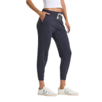 Vuori 02. WOMENS APPAREL - WOMENS PANTS - WOMENS PANTS ACTIVE Women's Performance Jogger - Long HMD MIDNIGHT HEATHER